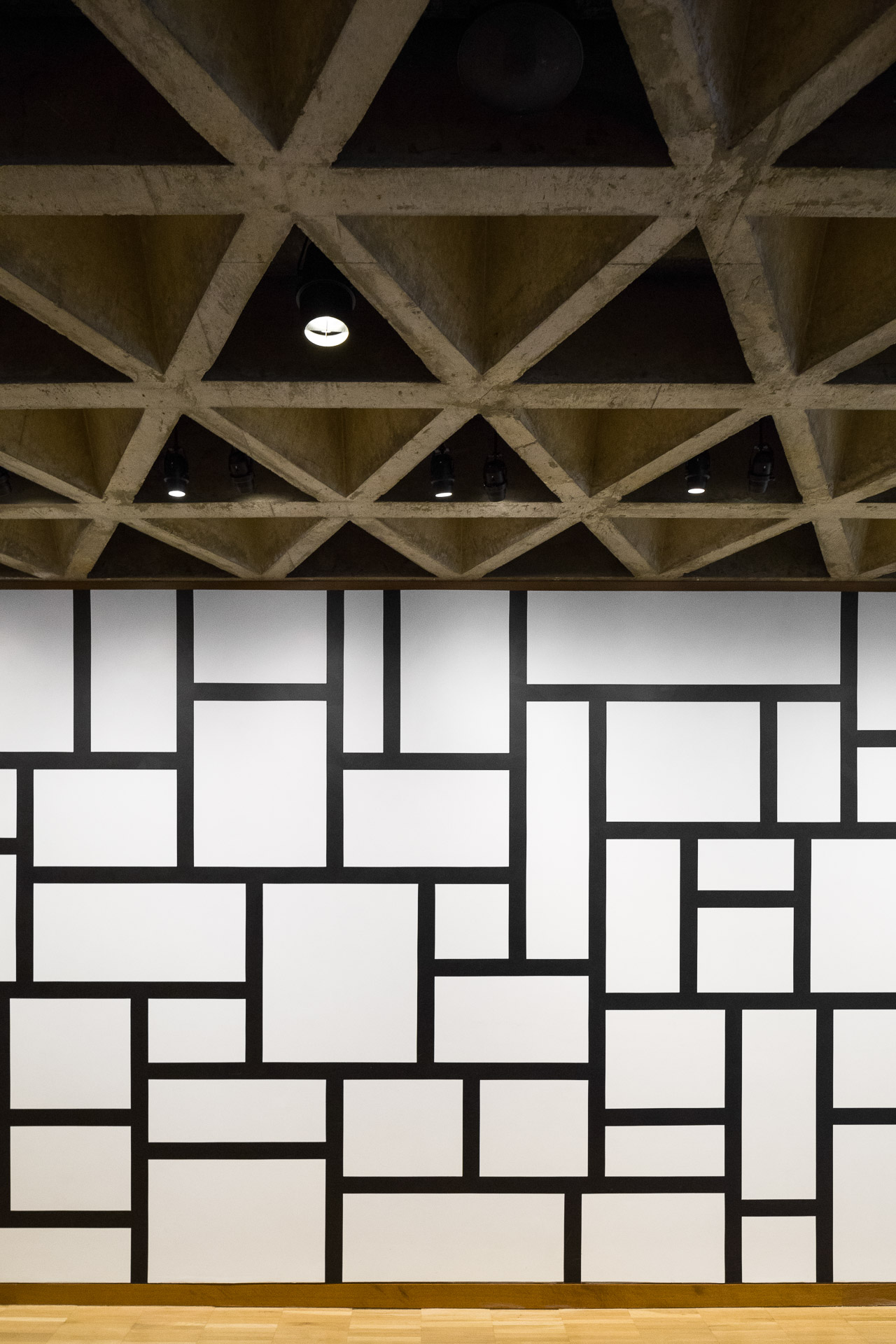 Interior of Yale University Art Gallery in New Haven, CT by Louis Kahn. Mural by Sol LeWitt. Photo by Jason R. Woods.